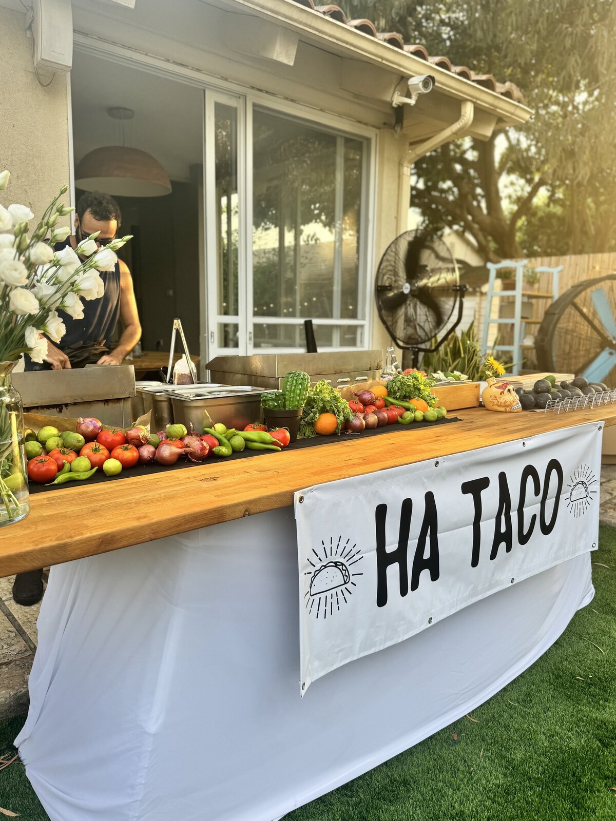 Taco bar with white floral styling