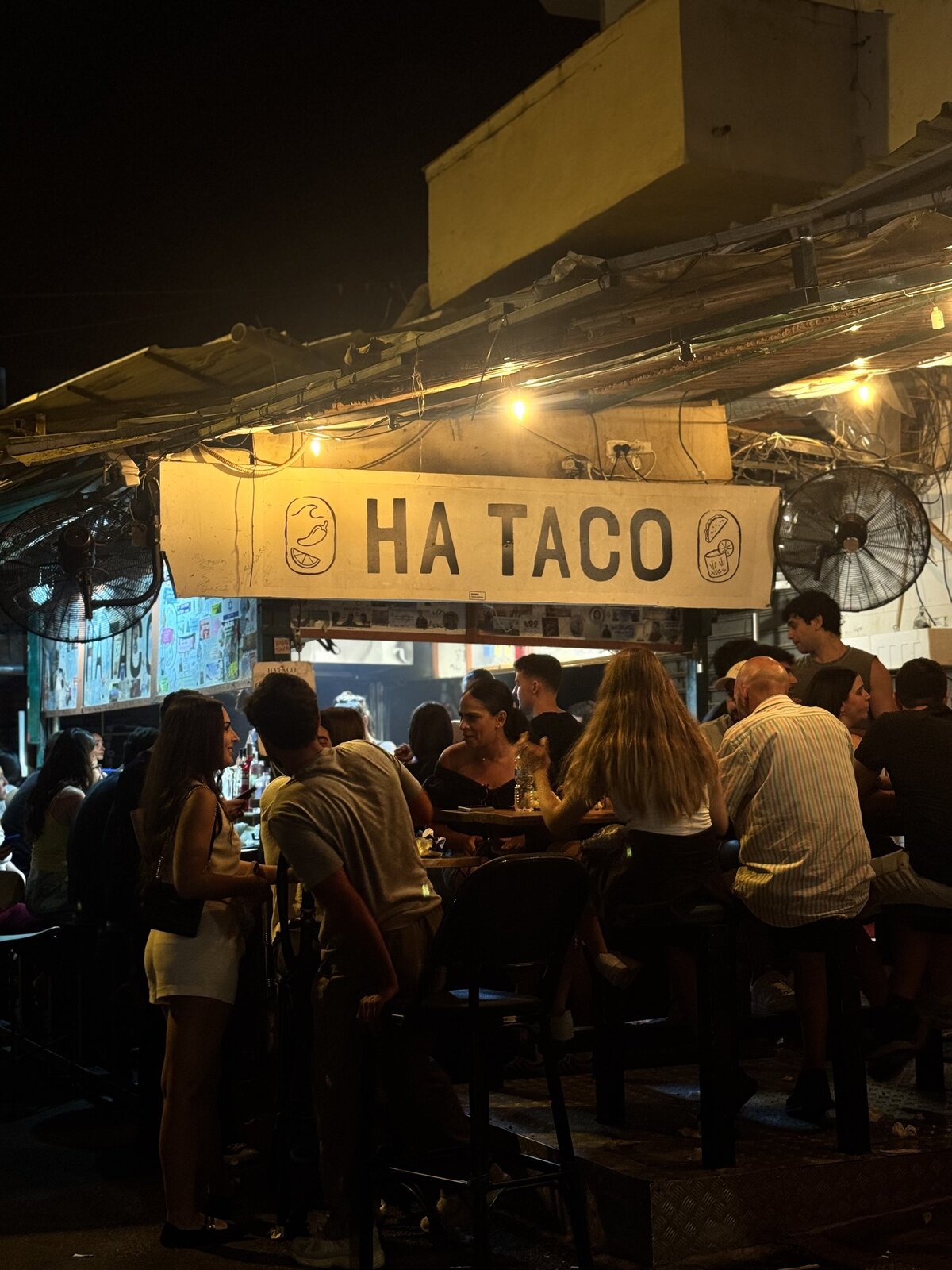 Carmel Market at night with warm lights